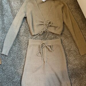 Knitted beige revolve set of skirt and top.
